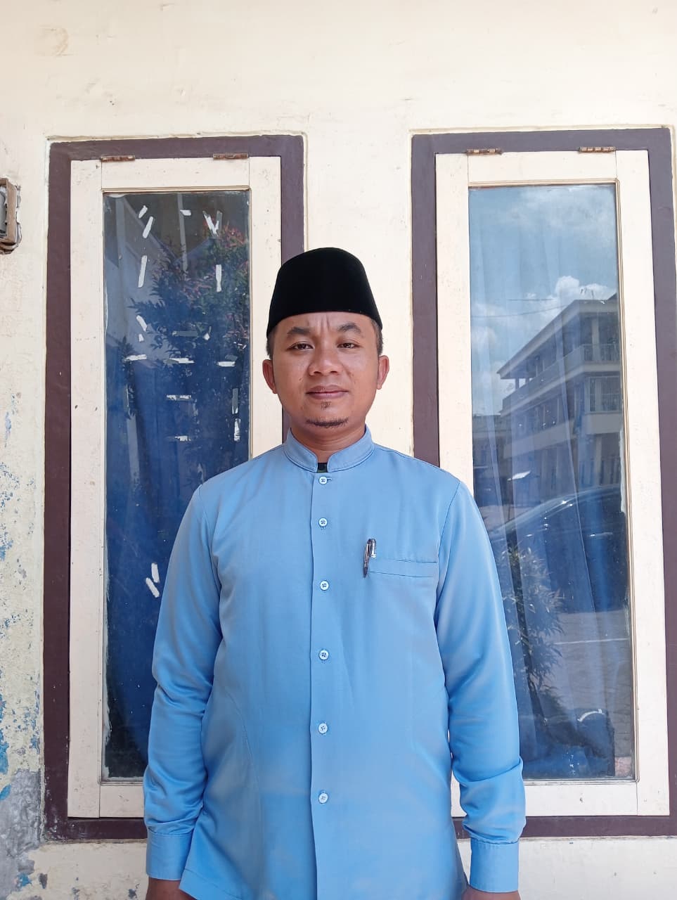 Syarifuddin, S.Pd